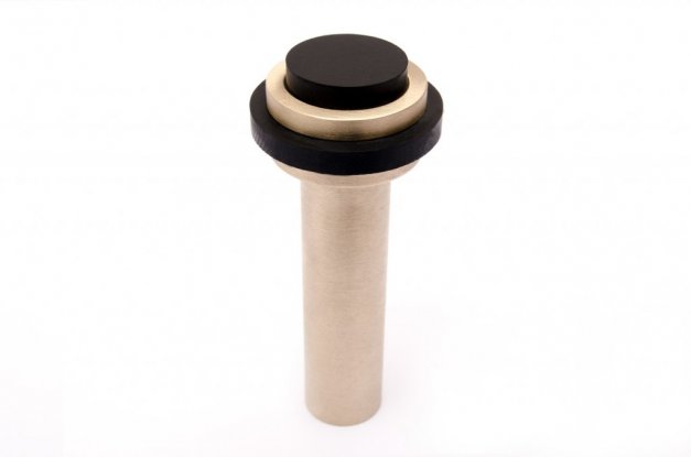 snygg dörrstopp i borstad mässing