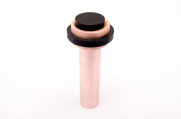 snygg dörrstopp i borstad koppar