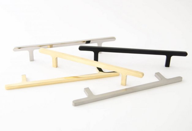 Modern handles in brass, stainless steel and black aluminium