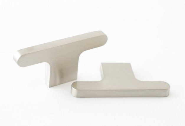 fina köksknoppar i borstat rosfritt köksinredning