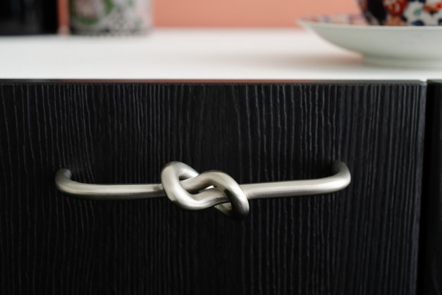 kitchen handle with knot in brushed nickel