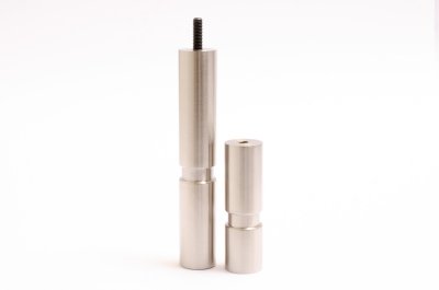 cylinder shaped furniture legs in polished stainless steel, nice legs in stainless steel, designed furniture legs